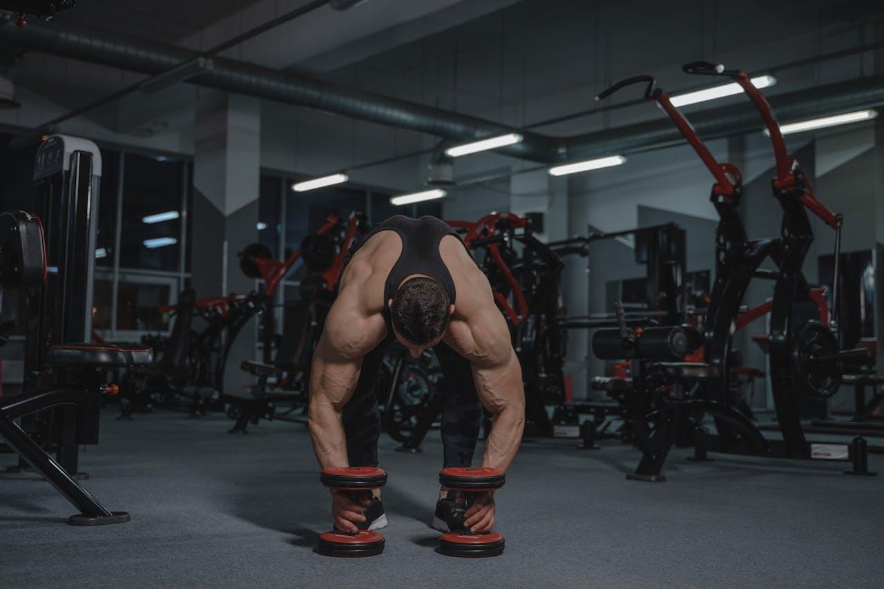 a man doing exercise at gym